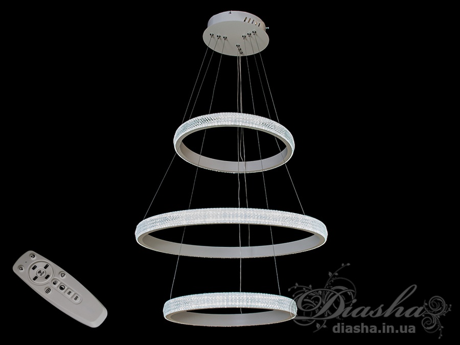 Перед Вами зовсім нове та незвичайне виконання плафонів, що обрамляють LED лампи. Така люстра легко підійде під будь-який інтер'єр &ndash; класичний, сучасний і навіть у стилі &laquo;хай-тек&raquo;.

У комплекті з люстрою йде найсучасніший тип пульта з електронним диммером та регулятором кольору. З пульта можна включити один із встановлених режимів освітлення - тепле світло, холодне світло, нейтральне; включити режим 
