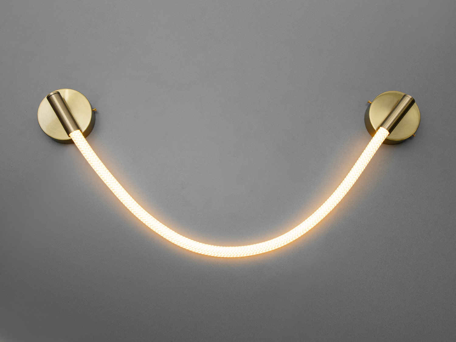 Настінне LED бра Ropelight, бронза, 10 Вт, 3200K. Гнучкий текстильний шнур створює м’яке акцентне світло для спальні, вітальні та комерційних інтер’єрів.