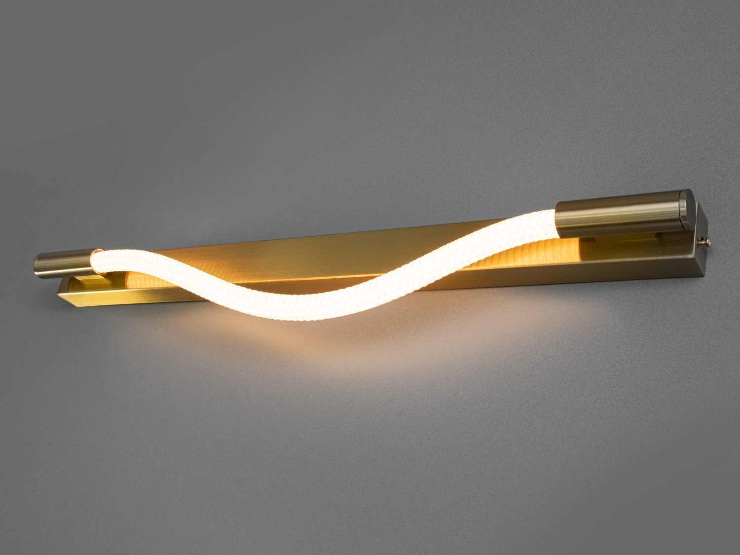 Настінне LED бра Ropelight 5 Вт у золотистому кольорі з хвилястим елементом — рішення для акцентного підсвічування вітальні, спальні чи коридору. Арт. 9602-600G.