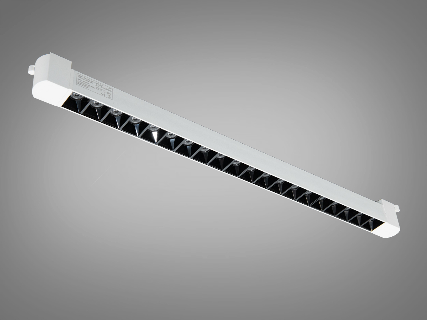 Лінійний LED світильник 35 Вт, 4000К, кут 24°, білий металевий корпус. Поворотний модуль для трекових систем 220 В — для акцентного та робочого освітлення.